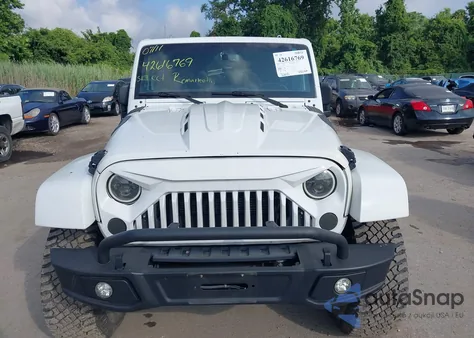 2015 Jeep Wrangler Unlimited Sahara из США, поврежденный, VIN 1C4BJWEG9FL701027